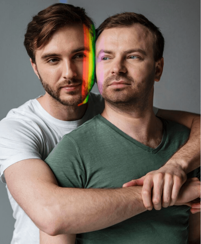 Happy gay couple connecting online